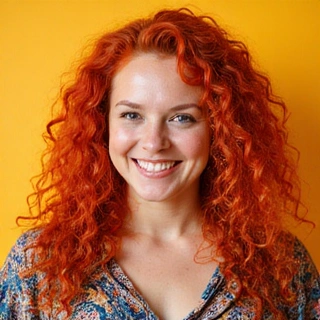 A vibrant woman with an energetic smile, representing a community engagement specialist.
